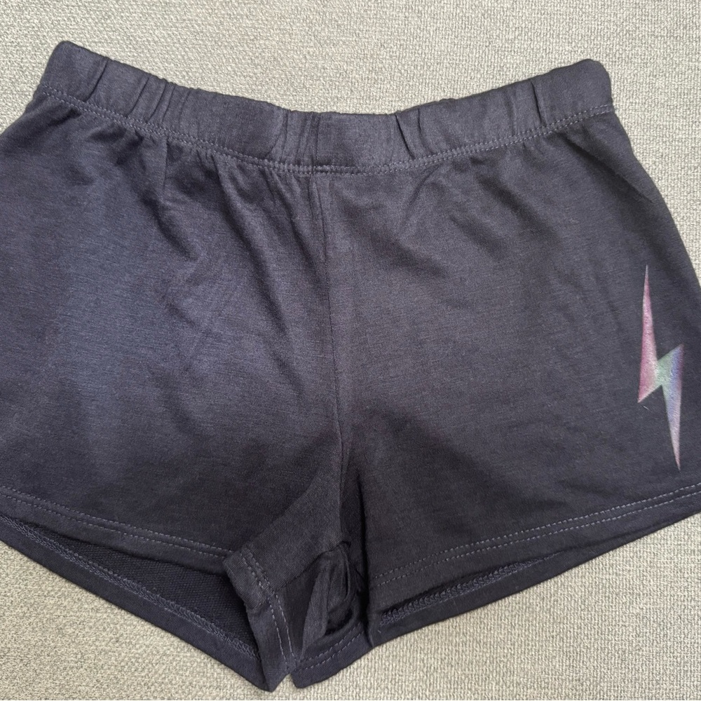 Girls NWT Firehouse shorts with an iridescent lightening bolt on left side.